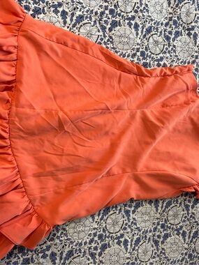 Do Be Large one shoulder orange dress
My daughter wore it once to a party. Comfy